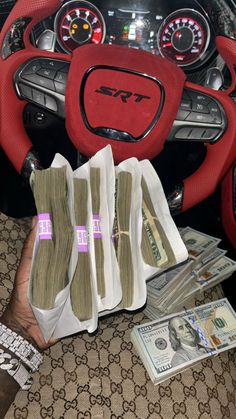 the interior of a car with money and cash