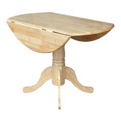 a wooden table sitting on top of a white floor