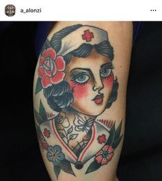 a woman's face with flowers and cross on her left arm is shown in this tattoo