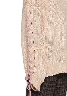 Get technical while looking cute in this sweater that has a chunky knit construction, a v-neckline, a lace up design on the sleeves, and an oversized fit. Pink Textured Knit Acrylic Sweater, Chic Pink Textured Knit Sweater, Pink Acrylic Cable Knit Sweater, Pink Hand-knitted Acrylic Sweater, Oversized Pink Playful Sweater, Knit Oversized Sweater, Sweater With Lace, Oversized Knit Sweater, Oversized Knitted Sweaters