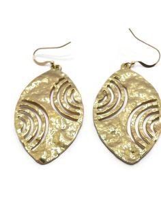 Gold Hammered Oval Earrings, the Ear Wires/Hooks are 14ct Gold Filled Stamped,  Approx. size - 20.5mm x 16mm, Hammered Oval Charms are Gold Plated Brass Approx. size - 29mm x 50mm. Approx. Length of Earrings - 46.3cm x 2.9cm Presented in a Gift bag. Due to hygiene reasons Earrings cannot be returned unless they are faulty, please contact me upon receipt if they are faulty. A580 DELIVERY This item will be sent Free delivery UK ONLY via Royal Mail 1st class Standard. Estimated Delivery Next Day af Yellow Gold Oval Metal Earrings, Oval Brass Earrings For Pierced Ears, Single Gold Oval Earring, Single Oval Gold Earring, Gold Oval Earrings For Pierced Ears, Oval Metal Pierced Earrings, Nickel Free Gold Oval Earrings, Nickel-free Gold Oval Earrings, Oval Metal Earrings