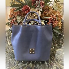 Dooney & Bourke Women's Blue Florentine Brenna. In Great Condition, Like New Minimal Usage. Please View Photos Closely And Feel Free To Ask Questions If Needed Before Purchasing. No Cross Body Chain. Blue Crossbody Satchel With Gold-tone Hardware, Blue Leather Bags With Gold-tone Hardware, Blue Crossbody Bag With Gold-tone Hardware, Dooney & Bourke Bag, Dooney & Bourke Bags, Dooney & Bourke, Dooney Bourke, View Photos, Leather Bag