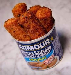 an open can of chicken nuggets on a table