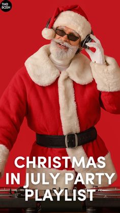 a man dressed as santa clause talking on a cell phone with the words christmas in july playlist