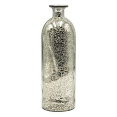 an empty glass bottle with silver flecks