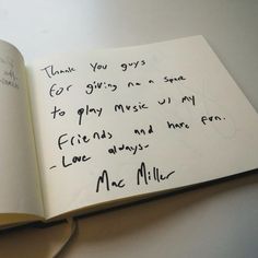 an open book with writing on it and someone's handwritten note to her