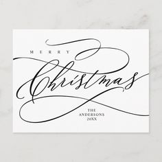 merry christmas card with the words merry christmas in blue ink on a white marble background