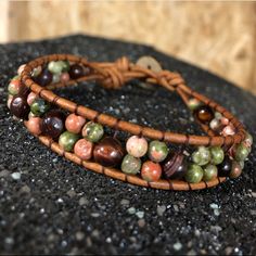 Brand New! Natural Leather Beaded Wrap Bracelet. Warm Earth Tones Of Coral, Green, Amber And Brown Round Beads And Natural Tan Leather. Button Closure. Gorgeous Warm Tones With Stylish Boho Chic Flare. 6mm Tiger Eye 4mm Green Unakite 1.5mm Leather Cord **Please Note-These Are Custom Made And Each Bead Varies Slightly In Color. Total Length Approx 10.25” Length From Closure Approx 9” Can Be Custom Made To Any Desired Length-Message Desired Length Prior To Purchase Beaded Wrap Bracelets, Beaded Wraps, Natural Tan, Bead Leather, Natural Leather, Leather Cord, Earth Tones, Tiger Eye, Tan Brown