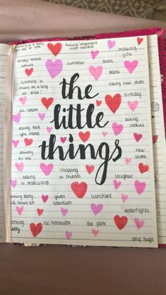 an open notebook with the words the little things written on it