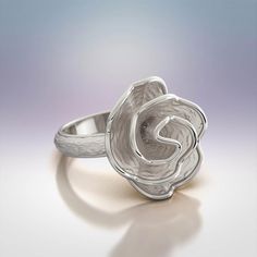 Elevate your jewelry collection with the exquisite beauty of our Rose Blossom Shaped Ring, meticulously crafted in Italy from your choice of 14k or 18k gold. This enchanting ring captures the delicate grace of a blooming rose, with its meticulously designed petals. The ring's distinctive allure lies in its juxtaposition of rough, textured surfaces that mimic the intricacies of nature, contrasted by polished edges that reflect light with a captivating brilliance. Experience the artistry of Italia Rose Blossom, Jeweled Earrings, Letter Bracelet, Italian Jewelry, Blooming Rose, Ring Pendant Necklace, Engagement Rings For Men, Engagement Ring Wedding Band, Men's Rings