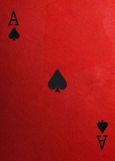 four ace playing cards on a red background