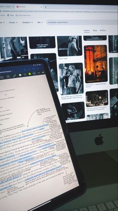 an apple computer sitting on top of a desk next to a keyboard and monitor screen