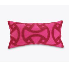 a pink and red decorative pillow on a white background