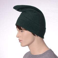 Simple dark green Phrygian cap hat made of fleece. This hat is made from a lightweight fleece fabric. Made so the hat points forward. Point can be pull up or folded forward. Machine washable. Fits heads measuring 22-24 inches MG001977 Green Windproof Cap, Phrygian Cap, Hat Cosplay, Elf Gnome, Green Elf, Gnome Hat, Costume Hats, Pull Up, Hat Making