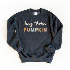 Looking for a cute versatile top to wear this summer? Make sure to grab one of our Hey There Pumpkin Colorful Sweatshirts! This soft and comfortable shirt is the perfect top for any outfit. It can be paired with biker shorts, Jeans, or the classic stay at home sweats! The bright color adds a pop of summer to any outfit. This sweatshirt is true-to-size, so be sure to order your regular size! If you are looking for a more oversized look, make sure to size up. Hey There Pumpkin, Colorful Sweatshirt, Sweat Shirts, Shorts Jeans, Hey There, Stay At Home, Biker Shorts, Bright Color, Graphic Sweatshirt