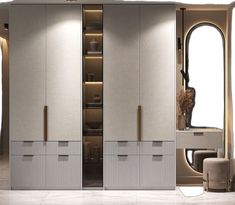 the interior of a modern bedroom with large closets and dressing area in beige tones