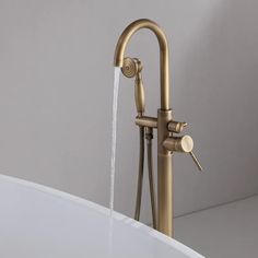 a faucet with water running from it in a bathtub