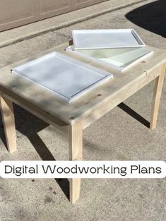 a wooden table sitting on top of a sidewalk next to a garage door with the words digital woodworking plans