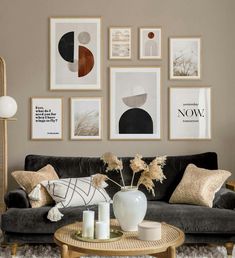 a living room filled with furniture and pictures on the wall above it's coffee table