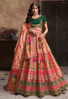 Peach banarasi silk lehenga choli for wedding 10284  Desc:  Style : Circular Lehenga Choli Color : Peach Fabric : Banarasi Silk Work : Sequence   Embroidery Wash Care : Dry clean Sleeve Style : Short Sleeve Long Sleeves : Done only in Custom Stitch Sleeves Lining : Done only in Custom Stitch Bust Size : 32 to 42 Inches Occasion : Wedding   Mehendi   Sangeet   Engagement   Bridesmaid   Reception   Ceremonial. With Express Free Shipping and Custom Stitching, Buy Lehenga - Indian Party wedding and bridal  Peach banarasi silk lehenga choli for wedding 10284 online in USA, UK and Canada from KollyBollyEthnics.com Diamond Lehenga, Dupatta With Belt, Sequins Lehenga Choli, Peach Diamond, Peach Lehenga, Silk Lehenga Choli, Choli Dress, Lehenga Choli Wedding, Choli Blouse