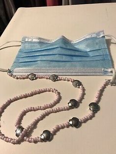 Seashells Clam And Pink Bead face mask Holder Kids teachers back to school | eBay Beaded Mask, Face Mask Holder, Clam Shells, Mask Holder, Necklace Holder, Wine Glass Charms, Pink Beads, Beach Themed, Badge Holders Lanyard