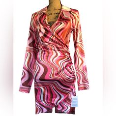 Stunning Dress, Long Sleeves, Lightweight, Feels/Looks Like Satin! Has Stretch If Needed. Side Ruched Gathering, Somewhat Of A Wrap Style, Just A Sexy Look And Feel To It. Size Us 6 Ptp Is 17” Length Is 35” From A Smoke Free Environment Please Feel Free To Ask Any And All Questions As All Sales Are Final, Thank You ! Long Sleeve Dresses With Abstract Print For Party, Stretch Printed Dress For Night Out, Fitted Mini Dress With Abstract Print, Printed Mini Dress For Date Night, Fitted Printed Dress For Date Night, Chic Abstract Print Mini Dress For Party, Trendy Printed Dresses For Night Out, Trendy Fitted Dress With Abstract Print, Red Abstract Print Dress For Party