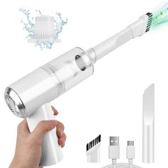 an electric toothbrush is being held up by someone's hand with the brush attached to it