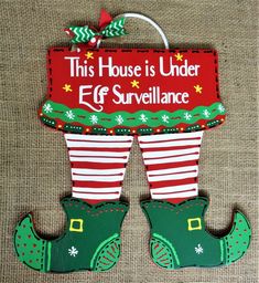 this house is under eff surveillance christmas stocking ornament hanging on the wall