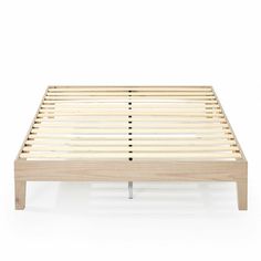 the bed frame is made from wood and has no sheets on it, but two legs are