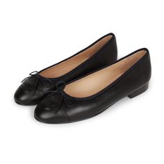 This pair of CC Ballet flats are in dark navy blue lambskin, with an embossed "CC" logo toe cap, tie front, tonal stitching, and black leather soles. Origin: ItalyCondition: New and never wornAccompanied by: Damaged Chanel box, Two shoe dustbagsSize: 37 EU Classic Navy Leather Shoes With Leather Sole, Chanel Ballet Flats Black, Black Chanel Flats, Chanel Shoes Black, Chanel Flats, Jewelry Gift Guide, Chanel Box, Fame Dr, Black Ballet Flats