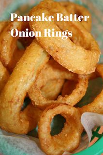 some onion rings in a green bowl on a table with the words pancake batter onion rings