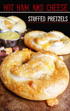 hot ham and cheese stuffed pretzels on a cutting board