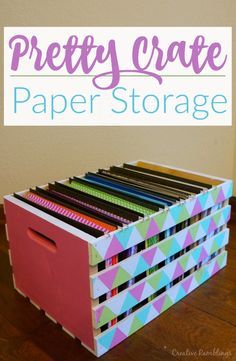 a box filled with lots of crafting supplies and the words pretty crate paper storage