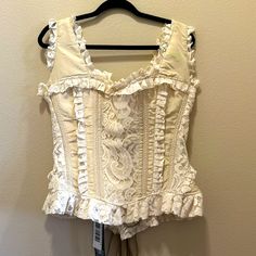 Nwt Burleska Overbust Boned Corset In Cream And Ivory. 5” Modesty Panel In Back And Will Fit A Large Variety Of Sizes. Minimum Size When Corset Is Laced Closed And Touching. Meaning Ideally Your Measurements Are Larger. Bust 38 Waist 30 So This Corset Will Easily Fit Up To Bust 44 And Waist 36 With Modesty Panel In Back. Cream Corset Top, Beige Lace Fitted Corset, Beige Wedding Corset, Fitted Feminine Beige Corset, Feminine Fitted Beige Corset, White Corset Costume Halloween, Vintage Corset Outfit, Bridgerton Halloween, Corset Fairy