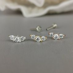 This is a set of a mini CZ crescent ear piercing jewelry removable end, which has three AAA CZ diamonds prong setting, with a threadless push back post. RECOMMENDED WEARING POSITION EAR PIERCING - Helix, Earhead/Forward Helix - Tragus, Anti-Tragus/Surface Tragus - Cartilage/Flat - Conch, Inner Conch, Outer Conch - Lobe/Standard Lobe, Upper Lobe MATERIAL - AAA Cubic Zirconia - 925 sterling silver with gold/rose gold plated - 925 sterling silver threadless push back post MEASUREMENT * Removable En Minimalist Internally Threaded Cartilage Earrings For Anniversary, Dainty Nickel-free Cartilage Earrings For Anniversary, Minimalist Internally Threaded Cartilage Earrings For Wedding, Delicate Single Cartilage Earring For Anniversary, Dainty Sterling Silver Internally Threaded Piercings, Internally Threaded White Gold Cartilage Earrings For Anniversary, White Gold Internally Threaded Cartilage Earrings For Anniversary, Silver Minimalist Wedding Piercings, Dainty Internally Threaded Sterling Silver Cartilage Earrings