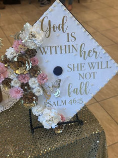 graduation cap idea: god is within her God Inspired Graduation Cap, God Is Within Her She Will Not Fail Grad Caps, God Is Within Her She Will Not Fail Cap, All Glory To God Graduation Cap, Bible Quotes For Graduation Caps, Bible Verse For Graduation Cap, Graduation Cap Designs Faith, Graduation Cap Christian Ideas, Graduation Cap Ideas Bible Verses