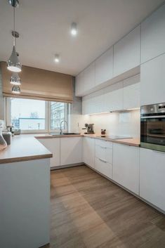 the kitchen is clean and ready for us to use in its new owner's home