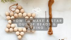 an arrangement of wooden beads and knitting needles on a white background with the words how to make a star out of beads and string