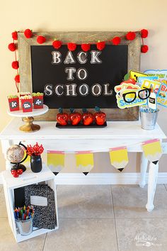 the back to school party is set up with decorations