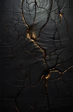 an abstract photograph of cracked wood with light coming from the cracks in it's surface