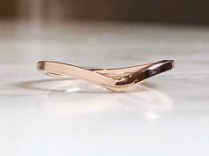 This gorgeous 14k rose gold ring makes a perfect everyday ring. It will sit comfortably on your finger and will look great under a solitaire engagement ring. Or stack with my sterling silver and 14k yellow gold chevron rings. Dimensions: The ring shank is square and is 1.5mm wide All of my jewelry comes in a gift box, with a ribbon, so it's ready for gift giving to friends or family - or a little treat just for you! If you have any questions, please email me! I'd love to speak with you! Shipping Gold Chevron Ring, V Ring, Stacked Wedding Bands, Stacked Wedding Rings, Ring Rosegold, Arrow Ring, Gold Chevron, Chevron Ring, 14k Rose Gold Ring