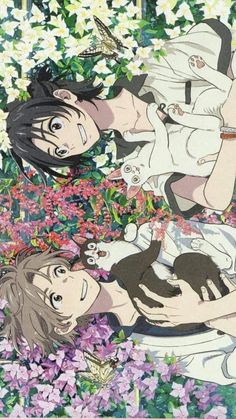 two anime characters are laying on the ground with flowers in front of them and one is holding a cat