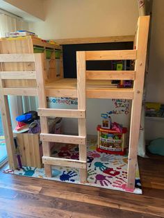 a child's bedroom with bunk beds made out of wood