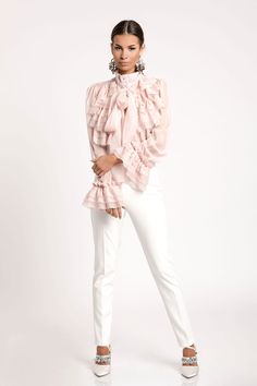 "Transport yourself to an era of timeless elegance with our exquisite light pink formal chiffon designer shirt. Inspired by the grace and sophistication of the Victorian era, this shirt is a masterpiece of design, blending vintage charm with modern style. Whether you're attending a formal event, a romantic soirée, or simply want to channel your inner royalty, this shirt is your passport to a world of refined fashion. Features: 🌸 Victorian Aesthetic: This shirt embodies the opulence and intricate detailing of the Victorian era. From the high neckline to the delicate lace cuffs, every element of this design pays homage to a bygone era of refinement. 💃 Chiffon Elegance: Crafted from the finest chiffon fabric, this shirt drapes gracefully, creating a sense of ethereal beauty as you move. The Pink Chiffon Blouse, Turtleneck Blouse, Formal Top, Victorian Blouse, Blouse Designer, Refined Fashion, Formal Tops, Pink Chiffon, Create Shirts