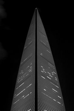 a very tall building that is lit up at night