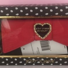 Betsey Johnson Large Red Bow Heart In The Middle Zip Around Black / Red Long Wallet New With Tags Will Come In Her Box! The Perfect Wallet To Match Any Of Your Betsey Johnson Bags! Beautiful Quilted Black Signature Betsey Lips Design With Large Red Bow! Rare Sold Out Betsey Johnson Wallet! Details, - Zip-Around Closure, Exterior Features Large Bow Detail, Hardware Logo Accent, Quilted Construction - Interior Features 8 Card Slots, 2 Bill Slots, Zip Pocket, Id Slot, Approx. 4.25" H X 8" W X 1" D Lips Design, Betsey Johnson Wallet, Bow Clutch, Hardware Logo, Pink Wristlet, Lip Designs, Betsey Johnson Bags, Large Bow, Grey Floral