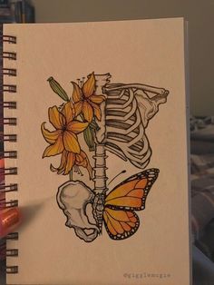 a drawing of a skeleton and flowers