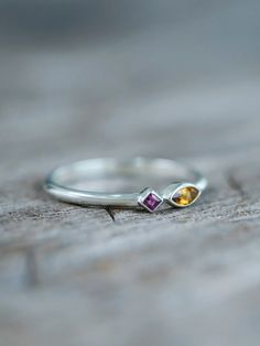 Two colors collide in this dainty citrine and ruby ring. Each piece of our jewelry is handcrafted with love. Yellow Sterling Silver Birthstone Ring, Yellow Birthstone Ring In Sterling Silver, Ethical Jewelry, Ruby Ring, Travel Case, Birthstone Jewelry, Jewelry Branding, Citrine, Jewelry Pieces