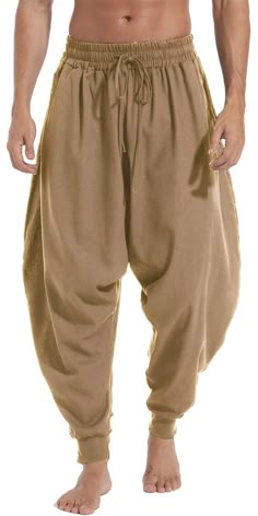 PRICES MAY VARY. Elasticated waist and ankles with two side pockets. Aladdin and hippie style adds a trendy and unique touch to your wardrobe. Wear these harem pants for men as loose fit cosplay pants, fashionable street wear, Halloween pants, dance pants, lounging pants, juggling clothes, hippie clothes & much more. Perfect for indoor and outdoor activities, or lounging around the house, these comfy mens harem pants with elastic waist effortlessly take you from day to night in superior quality Irish Mens Clothing, Futuristic Indian Fashion, Ancient Egypt Fashion Men, Greek Fashion Men, Ancient Egyptian Clothing Men, Egyptian Clothing Men, Mens Hippie Fashion, Gladiator Outfit, Mens Harem Pants