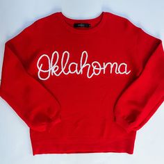 Be ready for game day or just show some school spirit with a hand embroidered collegiate sweater! These can be done in classic school colors or with any available color combination of your choosing. Just choose your colors in the personalization field during checkout.  If you don't see exact colors for your university, please message me, I would love to source something for you!  Yarns are 100% cotton and sweaters are 100% cotton or an acrylic blend based on selection. Sweaters have an oversized Collegiate Fall Sweater For College, Winter College Sweater With School Spirit, Collegiate Sweatshirt With Letter Embroidery For Game Day, Game Day Tops With Embroidered Logo, School Spirit Tops With Embroidered Logo For Game Day, Fall School Spirit Embroidered Sweatshirt, Collegiate Sweater For Game Day In Fall, Collegiate Fall Sweater For Game Day, Collegiate Style Sweater For Game Day In Fall